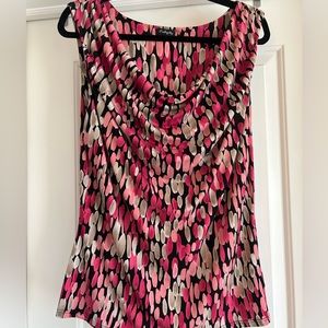 Size large, blousy shell. Worn only a few times